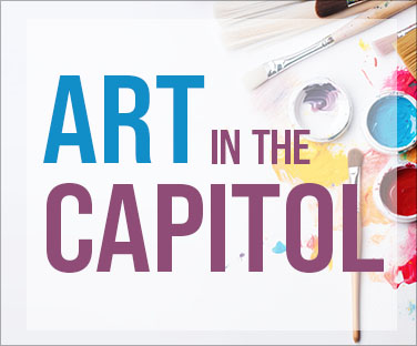 Art in the Capitol logo with paint and paint brushes in background